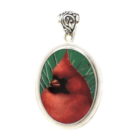 Broken China Jewelry Winter Greetings Cardinal Red Bird Left Green Background Sterling Oval Pendant
