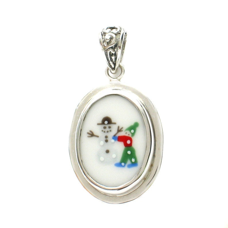 Broken China Jewelry Sleighride Let's Build a Snowman Winter Small Oval Pendant