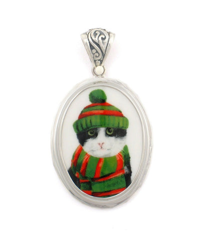 Broken China Jewelry Black and White Winter Cat in Green and Red Hat & Scarf Sterling Oval Pendant